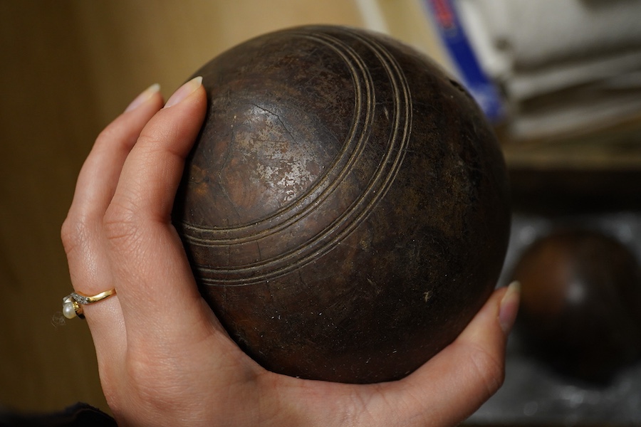 A set of four lignum vitae bowls